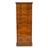 A 19th century walnut narrow collectors chest of drawers.