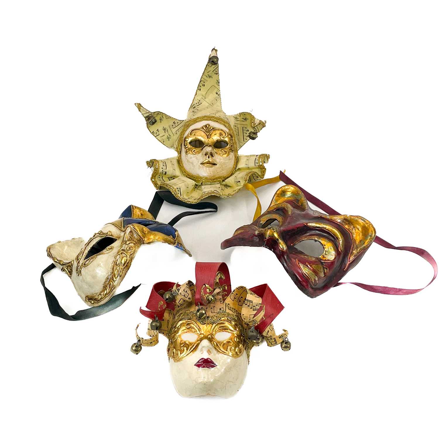 Four Venetian masks.