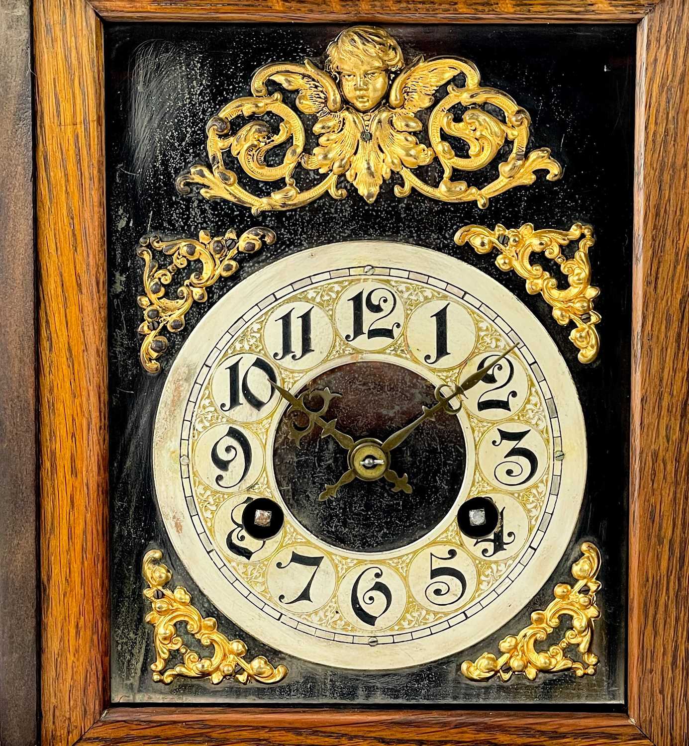 A German oak cased quarter striking mantel clock. - Image 9 of 12