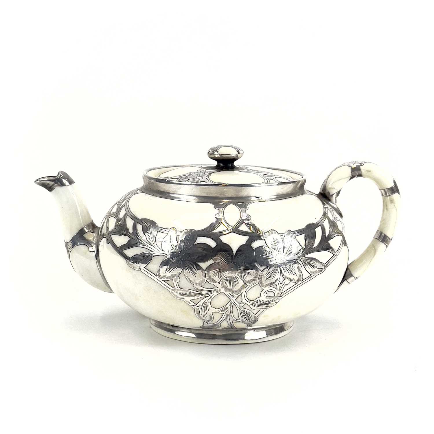 A Royal Doulton white glazed silver overlaid three-piece tea service. - Image 5 of 13