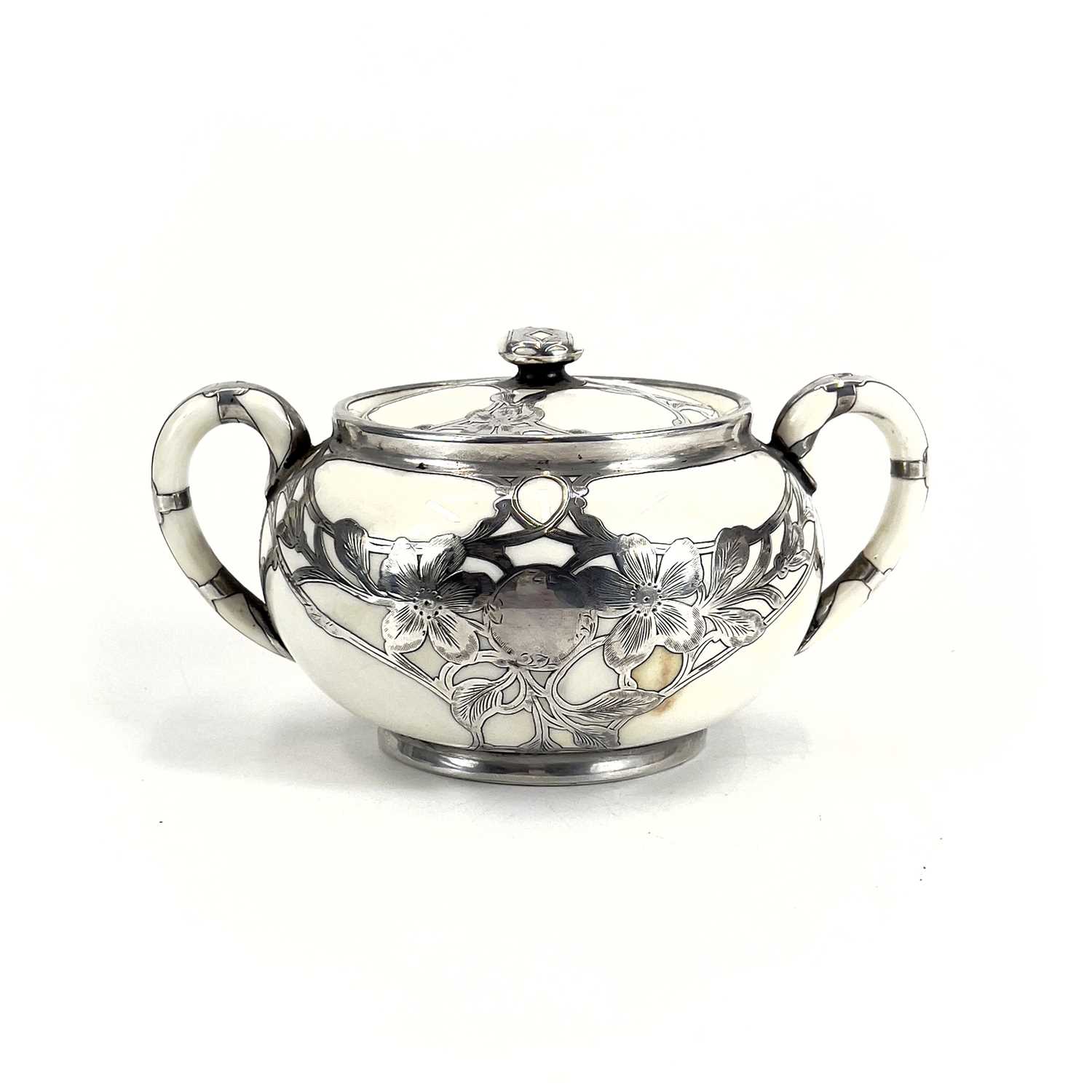 A Royal Doulton white glazed silver overlaid three-piece tea service. - Image 9 of 13