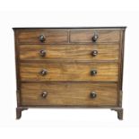 A George IV mahogany chest of two short and three long drawers.