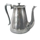 A silver plated ship's coffee pot.