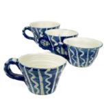 Four studio pottery teacups by Linda Craig.