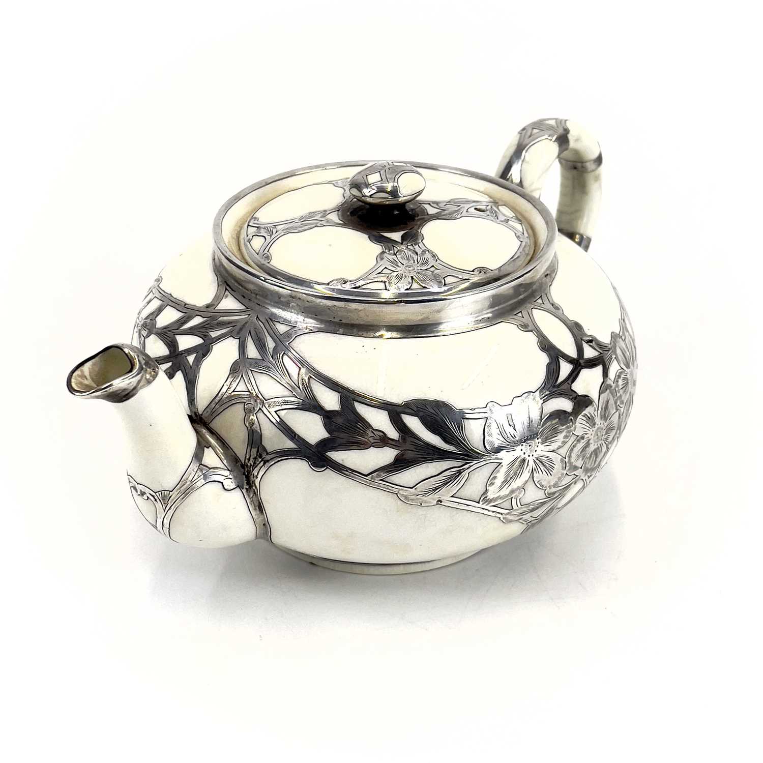A Royal Doulton white glazed silver overlaid three-piece tea service. - Image 6 of 13