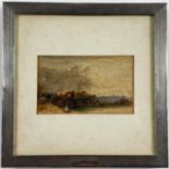 A silver picture frame with a 19th century landscape watercolour.