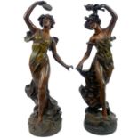 A pair of French spelter figures.