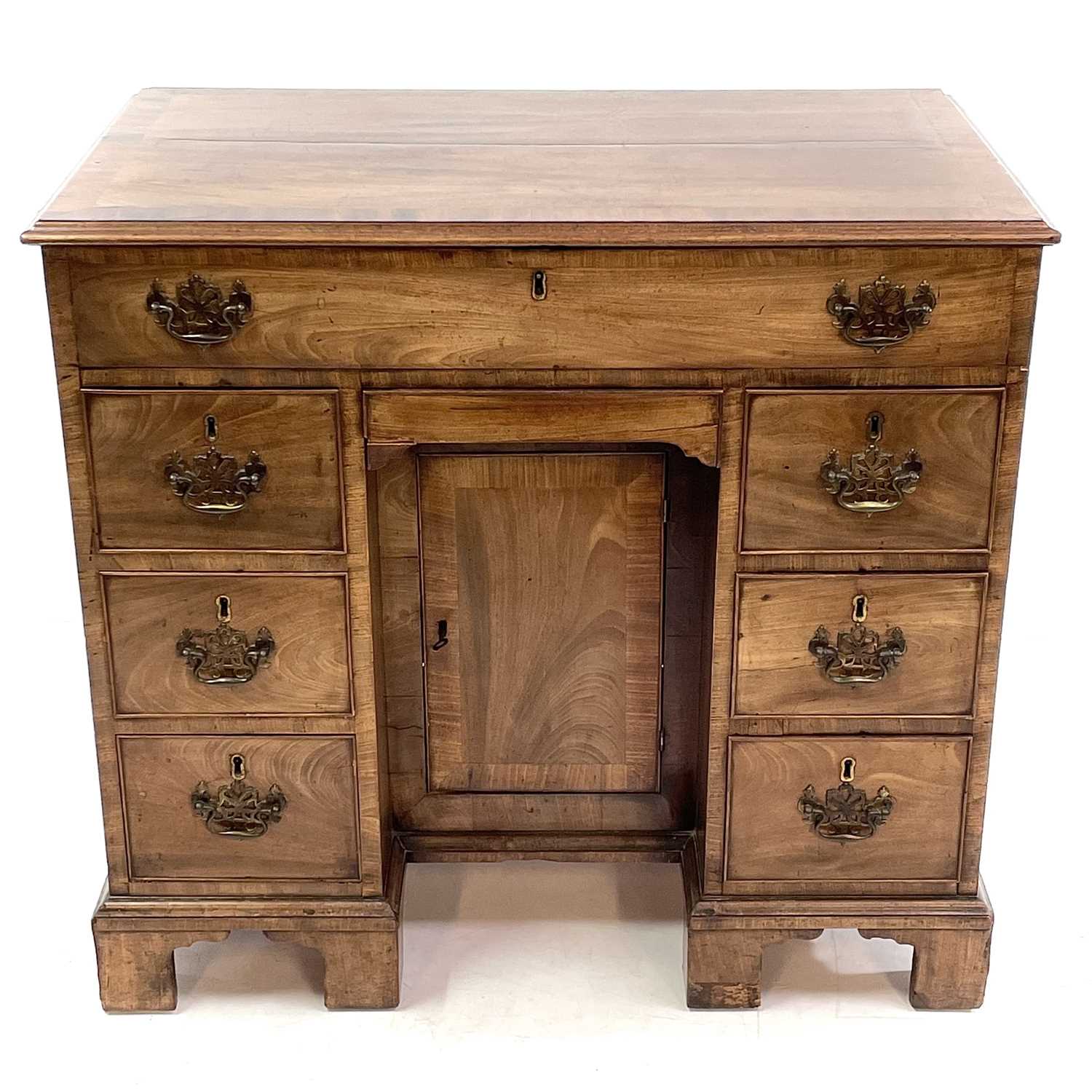 A George III mahogany kneehole gentleman's dressing table/writing desk.