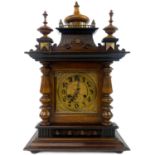 A German Black Forest style walnut mantel clock.
