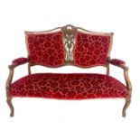 A late Victorian upholstered salon settee.