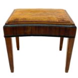 A Liberty & Co Art Deco ebonised and walnut stool.