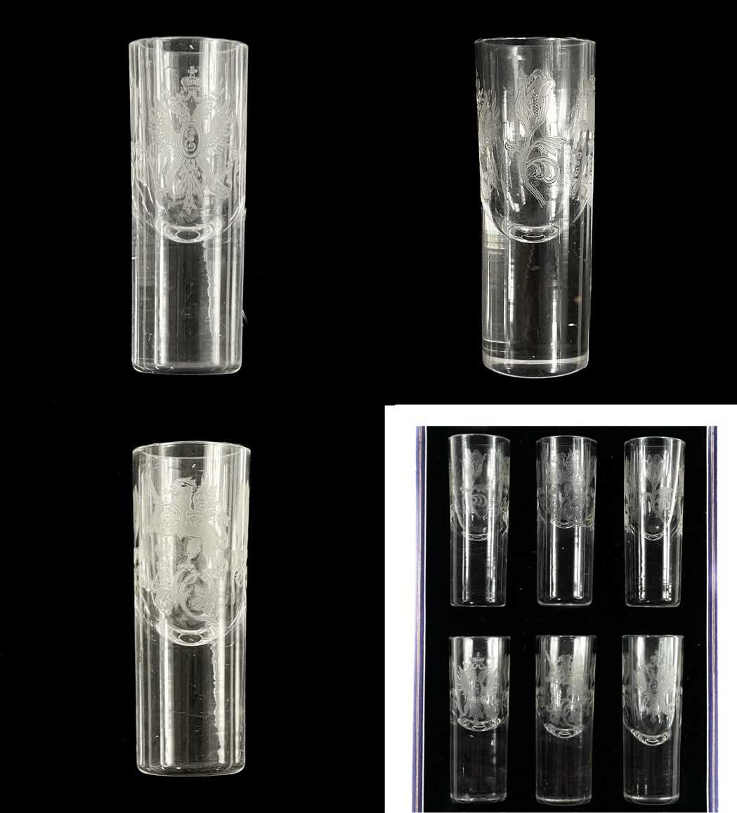 A set of six Russian imperial cylindrical vodka glasses.