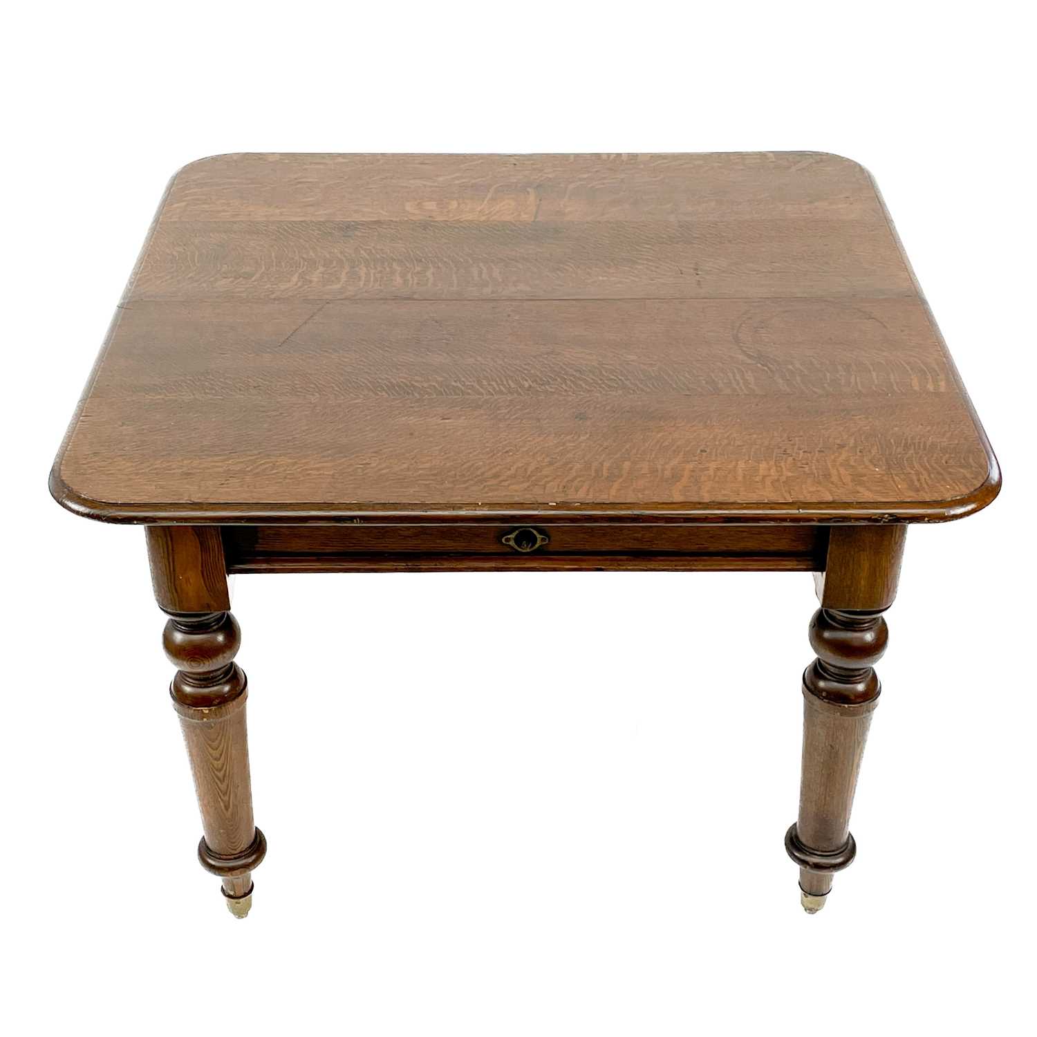 A late Victorian oak extending dining table. - Image 2 of 4