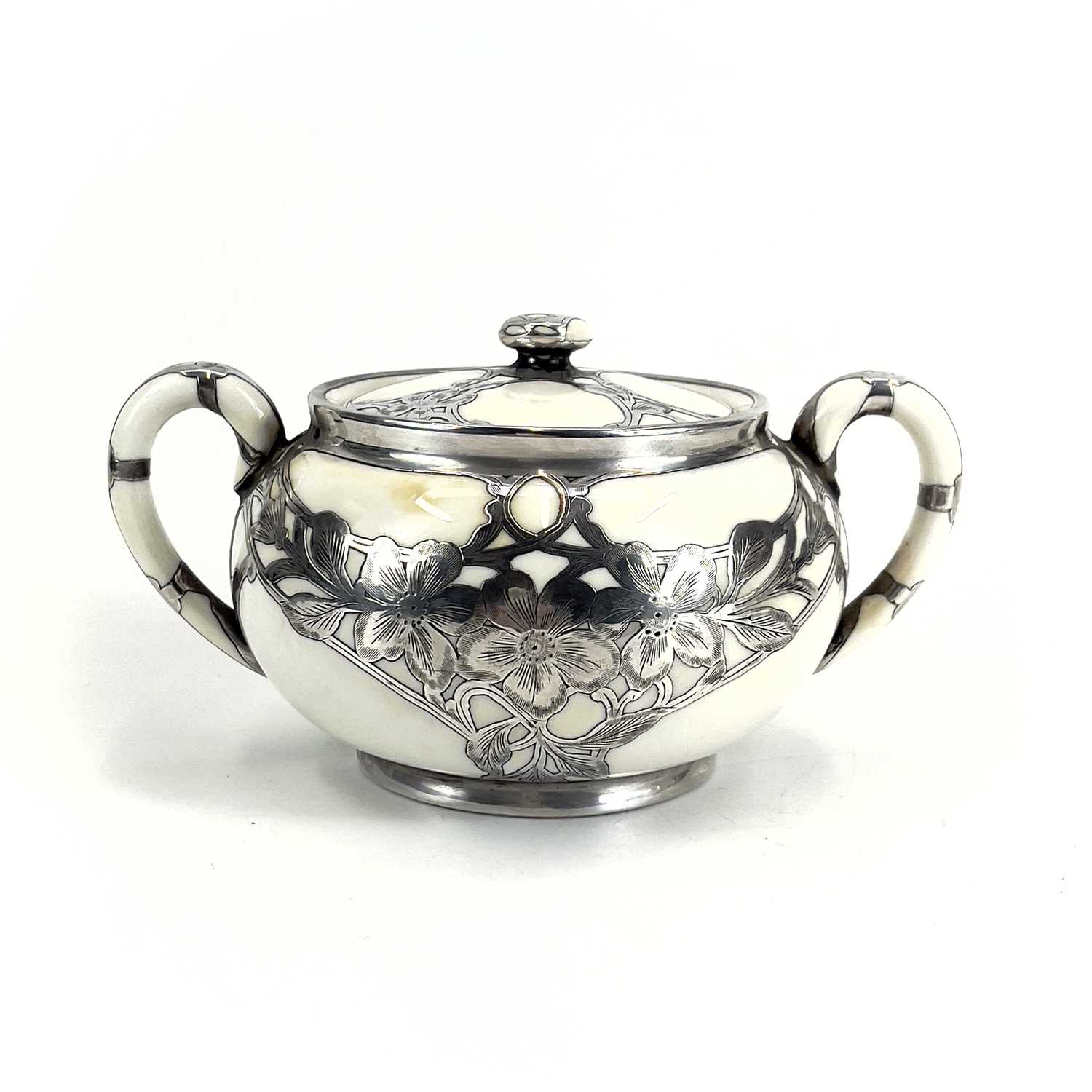 A Royal Doulton white glazed silver overlaid three-piece tea service. - Image 10 of 13