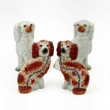 A pair of Victorian Staffordshire spaniels.