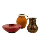 A Royal Barum Ware Terracotta Jug by Brannam Ltd together with other pottery items.