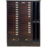 Wooden 32 drawer coin cabinet.