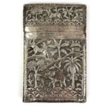 An Burmese silver card case, decorated with trees and animals,
