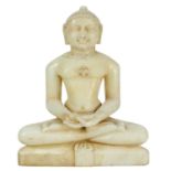 An Indian Jain white marble seated buddha, 19th century.