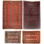 A Belouch rug, Afghan rug and two Pakistan rugs.