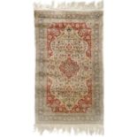 A Persian silk rug, circa 1930's.