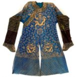 A Chinese silk embroidered dragon robe, late 19th/early 20th century.