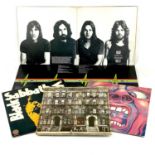 Five classic rock albums. 12" vinyl long players.