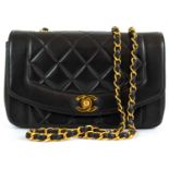 A Chanel black lambskin leather mini Diana bag.