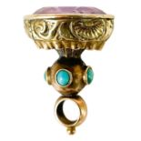 A Victorian bi-colour gold, turquoise and amethyst set fob seal.