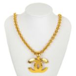 A good Chanel gold tone CC quilted pendant necklace.