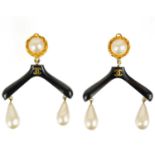 A Chanel rare pair of 1980's 'coat hanger' gold-tone clip earrings.