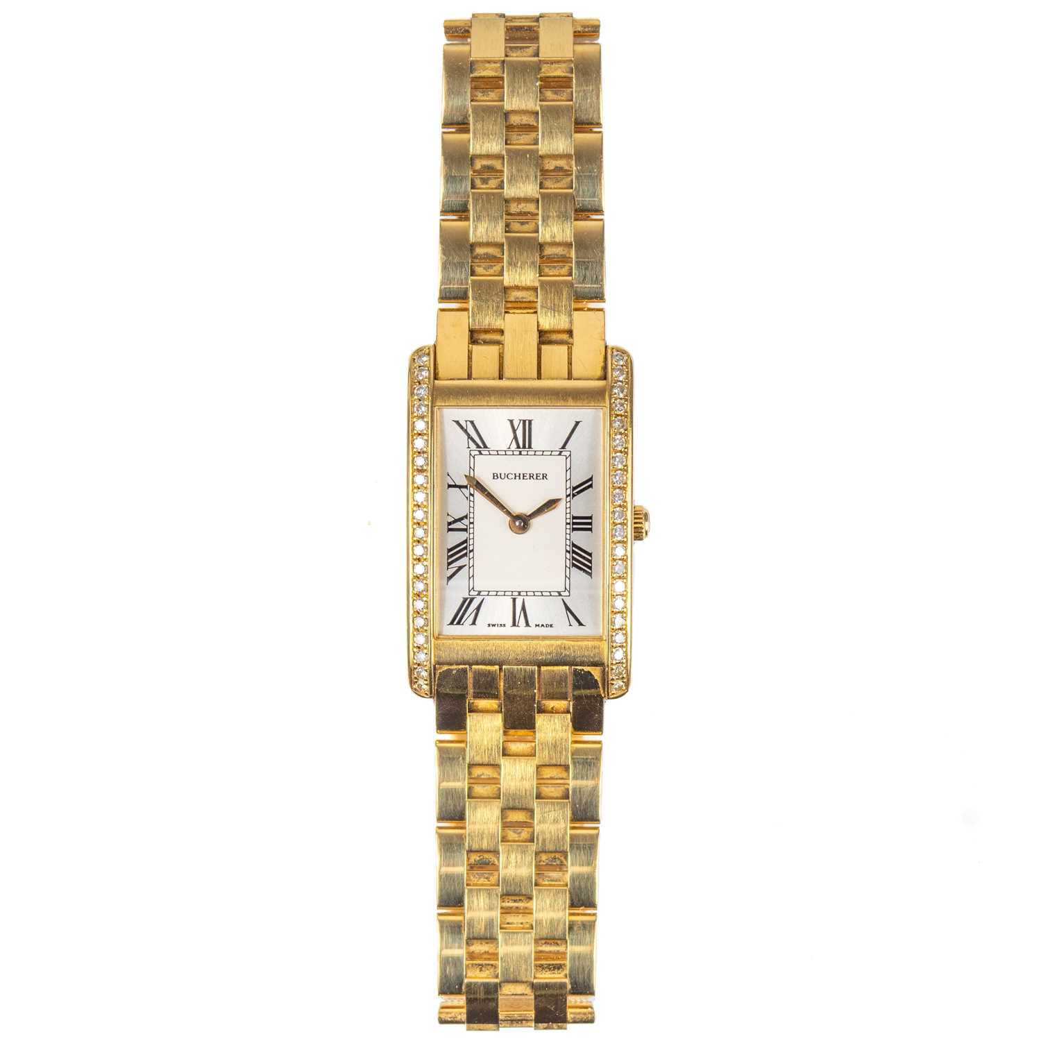 A Bucherer 'Eximia' 18ct gold and diamond set lady's automatic bracelet wristwatch.