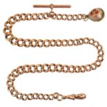 A 9ct rose gold graduated curb link Albert watch chain.