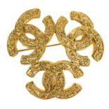 A Chanel triple CC gold plated brooch.