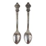 A pair of silver plated Rolex Bucherer souvenir teaspoons.