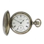 A Waltham sterling silver cased large full hunter crown wind pocket watch.