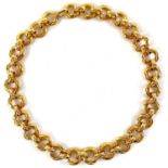 A Chanel gold plated hoop long chain necklace.