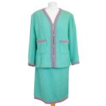 A Chanel Boutique turquoise Scoubidou 1994 collection dress suit with braided trim.