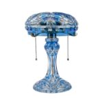 A blue overlay cut glass mushroom table lamp and shade.