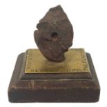 A piece of shrapnel from HMS Invincible at the Battle of the Falklands 8th December 1914.