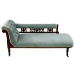 A late Victorian walnut upholstered chaise lounge