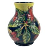 A Moorcroft Simeon pattern vase.