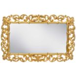A Florentine framed gold painted bevelled edge mirror.