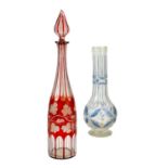 A Bohemian red overlay glass decanter and stopper.