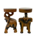 A pair of carved hardwood occasional tables.