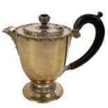 A George V Irish silver hot water pot by Reid & Sons, Dublin.
