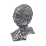 A Victorian silver novelty pepperette in the form of a knight's helmet.