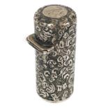 A Victorian silver cylindrical hinge lidded scent bottle by Sampson Mordan & Co.
