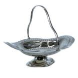 A George V silver pedestal swing handled bread basket.