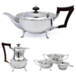 A George V silver four piece tea set by Cooper Brothers & Sons.